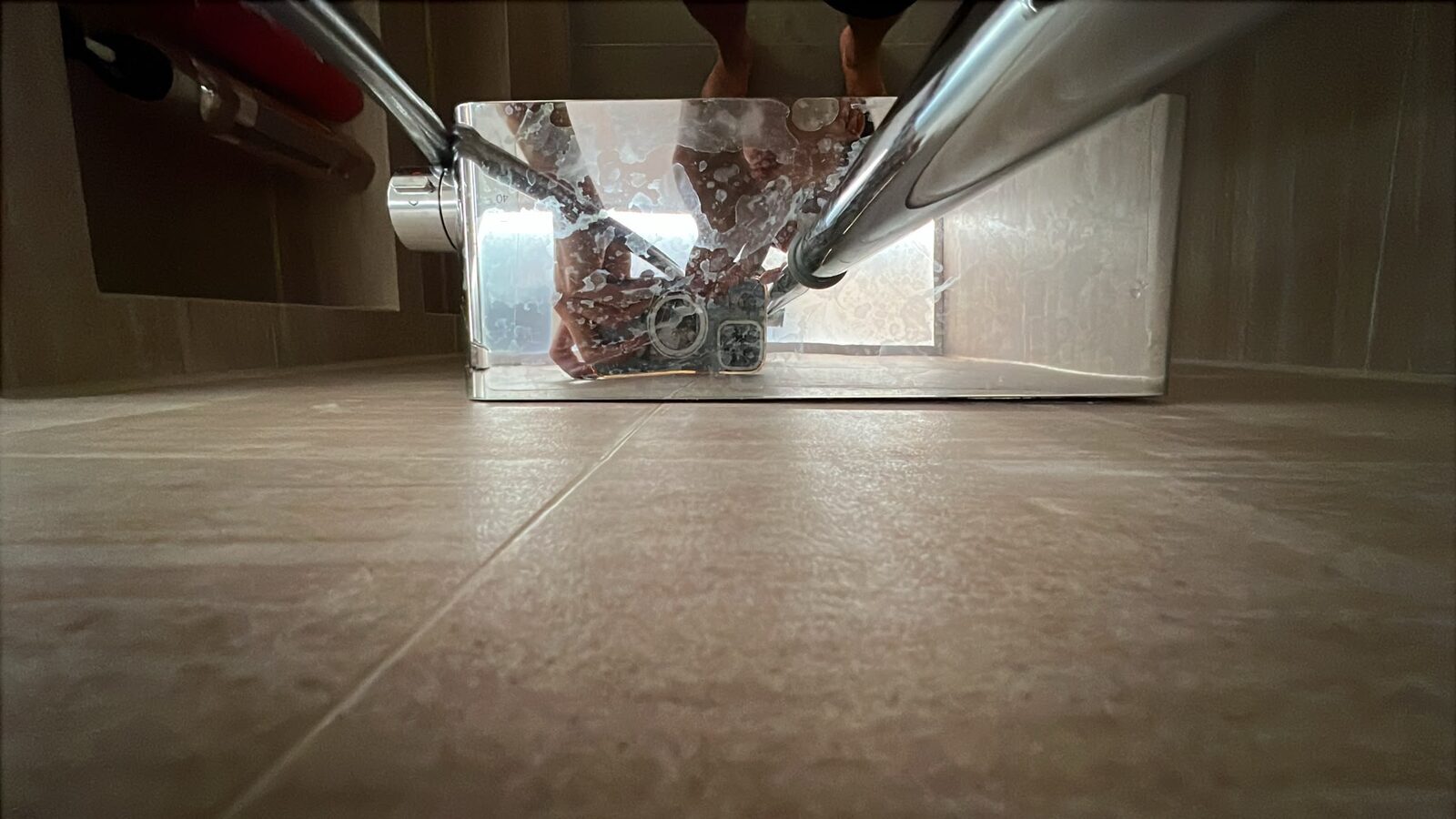 Master bathroom shower mixer sitting away from the tiled wall